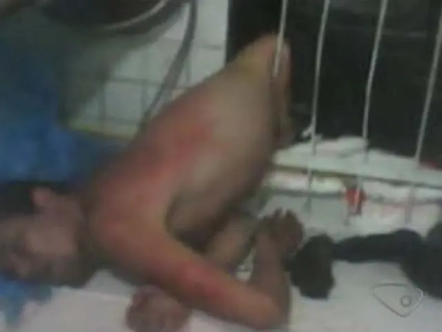 Assaltante tenta roubar padaria e fica entalado em grade