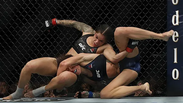 Brasileira mantém cinturão e vence de holandesa no UFC 245